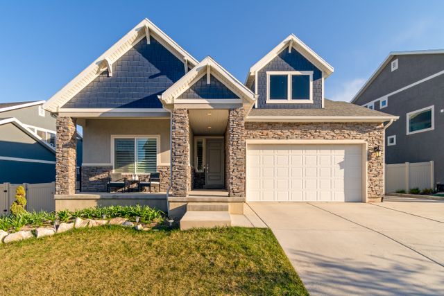 the exterior of a single-family home with stone bricks