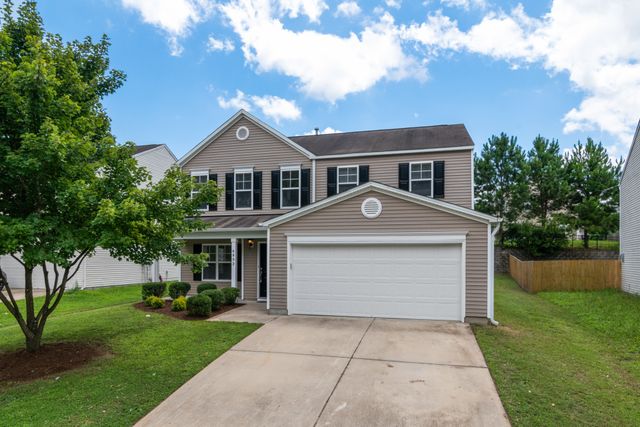 the exterior of a two-story suburban house